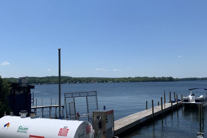 a boat parked next to a body of water