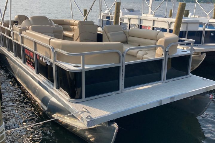 a boat is docked next to a body of water
