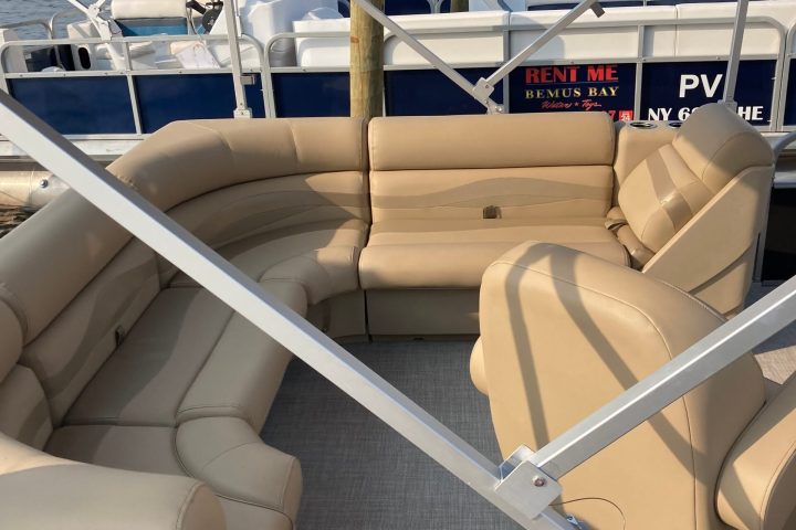 a plane sitting on top of a boat