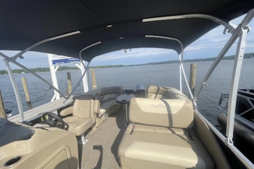 a boat that is sitting on a motorcycle